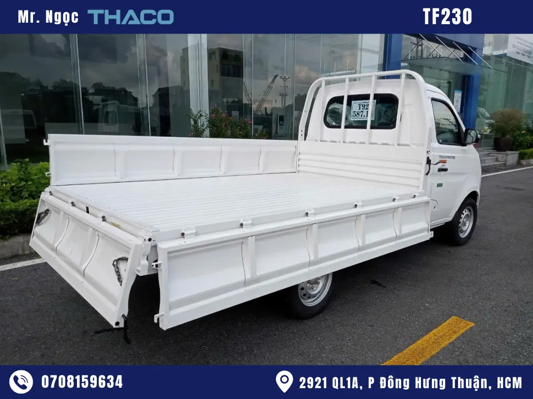 xe-tai-nhe-990kg hình ảnh xe tải thaco 990kg thùng lửng màu trắng